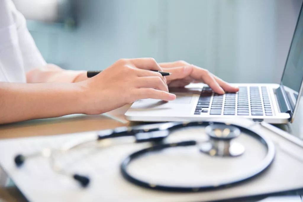 female Doctor using laptop